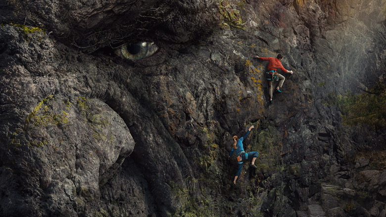 Two climbers unknowingly climbing the troll