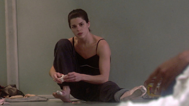 Neve Campbell puts on ballet shoes in studio 