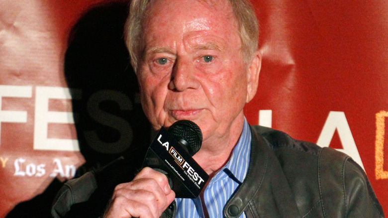 Wolfgang Petersen speaking into mic