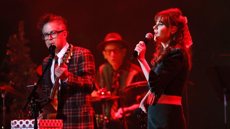 She & Him performing on stage