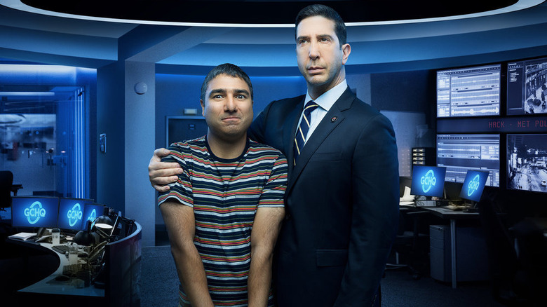 Schwimmer and Mohammed hug