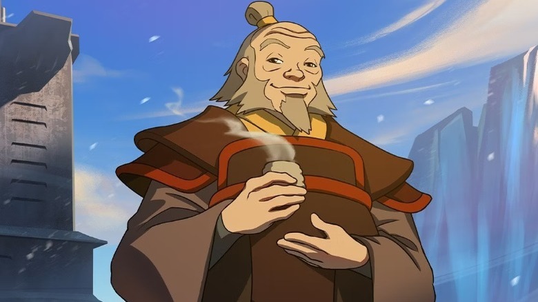 Iroh holding a hot drink