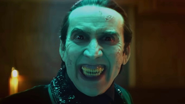 Nicolas Cage as Dracula baring teeth in "Renfield"