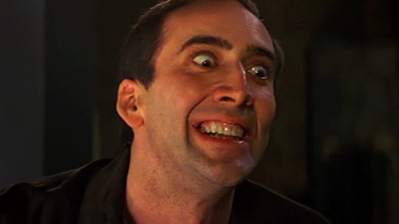 Nic Cage smiles like a madman