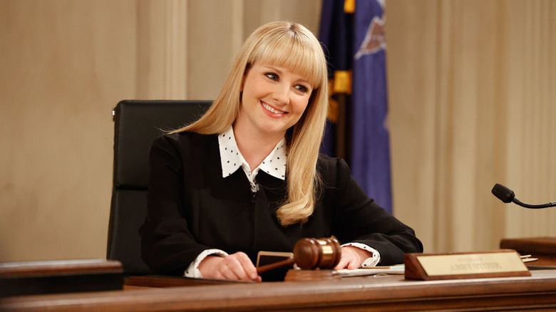 Judge Abby Stone smiling with her gavel