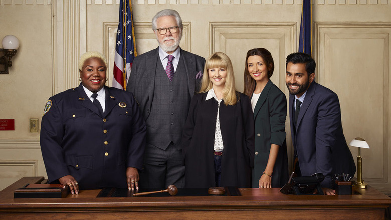 Night Court revival cast smiling in courtroom