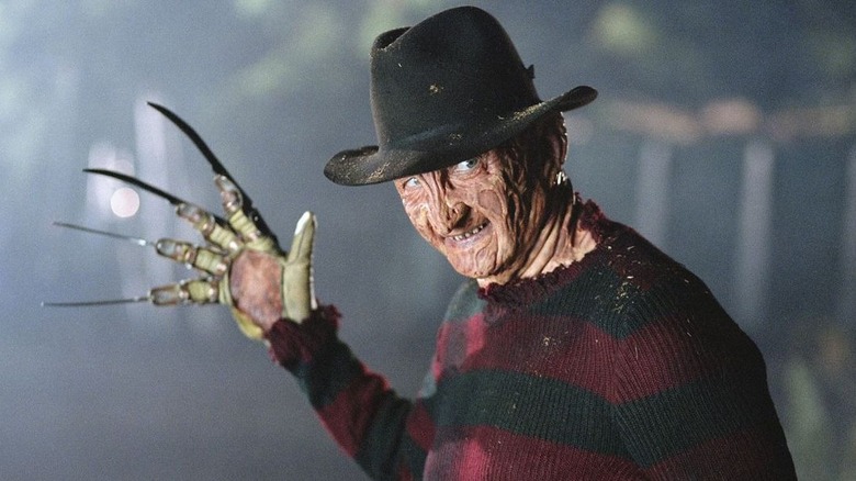 Freddy Krueger holding up knife hand