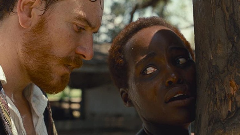 12 Years a Slave Michael Fassbender menaces Lupita Nyong'o