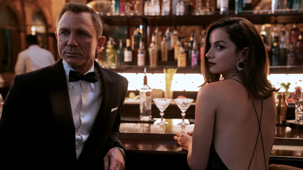 Bond and Paloma at the bar