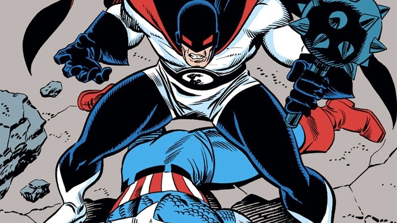 Flag Smasher standing over Captain America