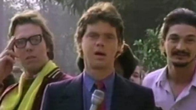 Rich Hall outside with microphone