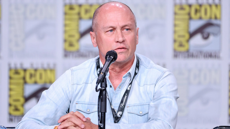 Mike Judge speaking into microphone