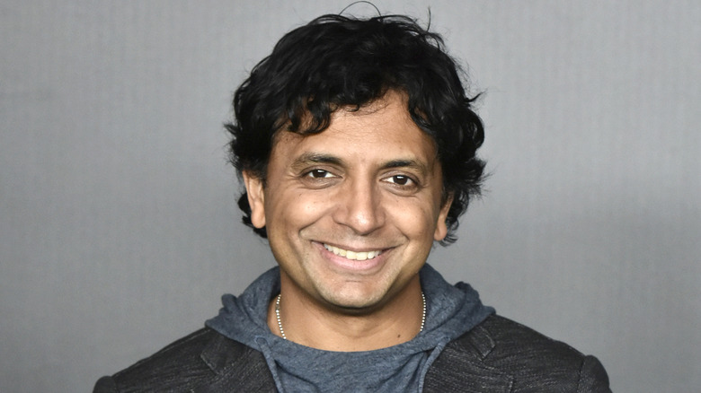 M. Night Shyamalan smiling