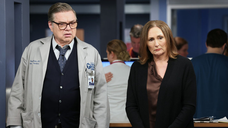 Oliver Platt and Nora Dunn looking concerned