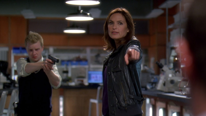 Olivia pointing at Stabler