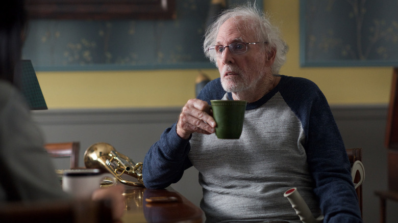 Bruce Dern drinking from a mug in The Gateway