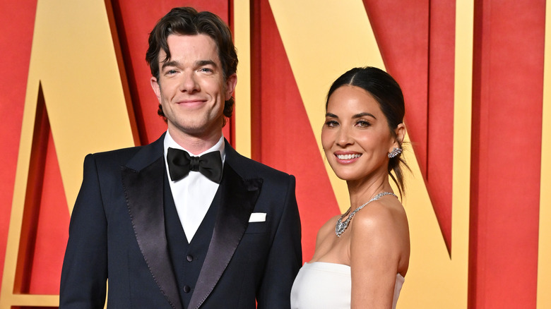 Olivia Munn and John Mulaney smiling