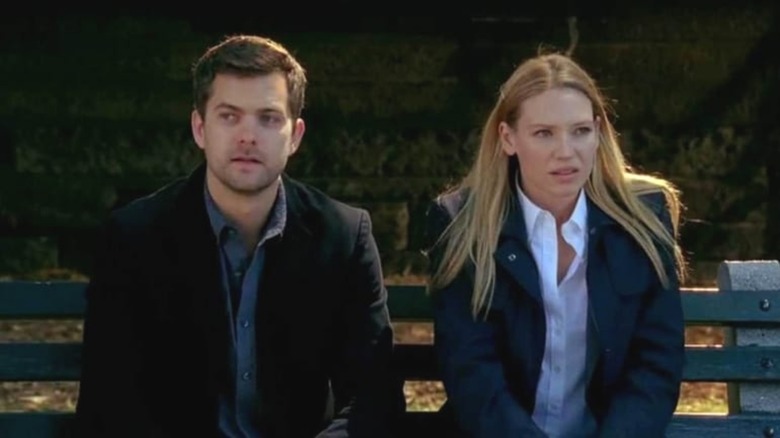 Olivia and Peter sitting on park bench