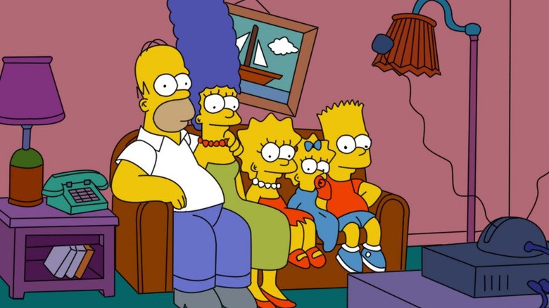 The Simpsons family watching TV