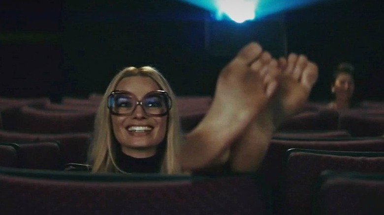 Margot Robbie shows off her feet