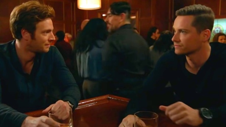 Nick Gehlfuss and Jesse Lee Soffer in a bar