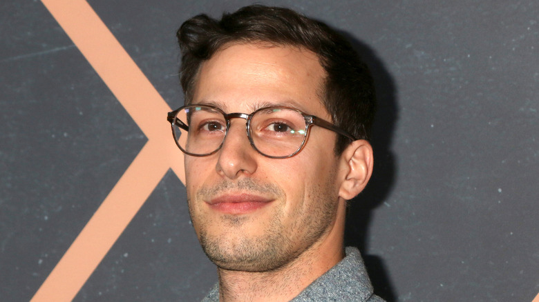 Andy Samberg at event smiling