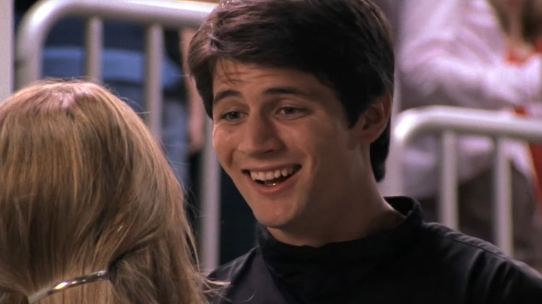 Nathan grinning at haley 