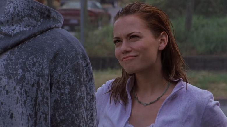 Haley and Nathan in the rain