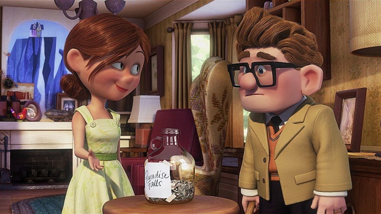 Ellie and Carl with their coin jar