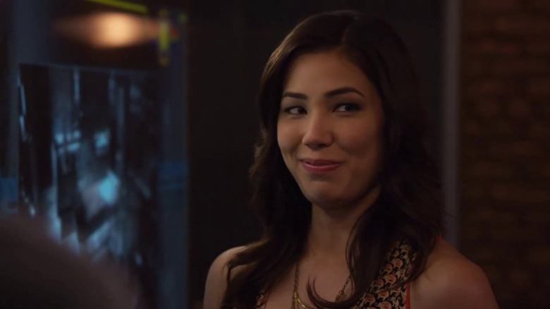 Angela Montenegro smiling wryly