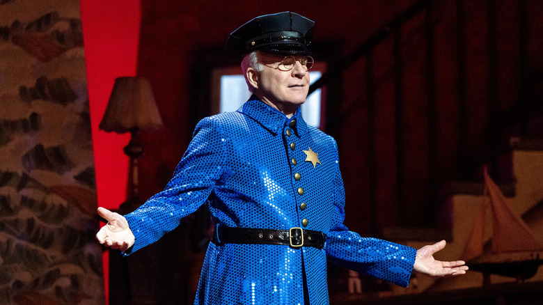 Charles sparkly police uniform performing