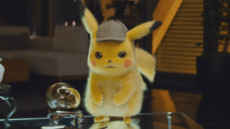 Detective Pikachu standing on a desk