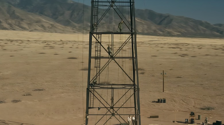 Workers climbing towers