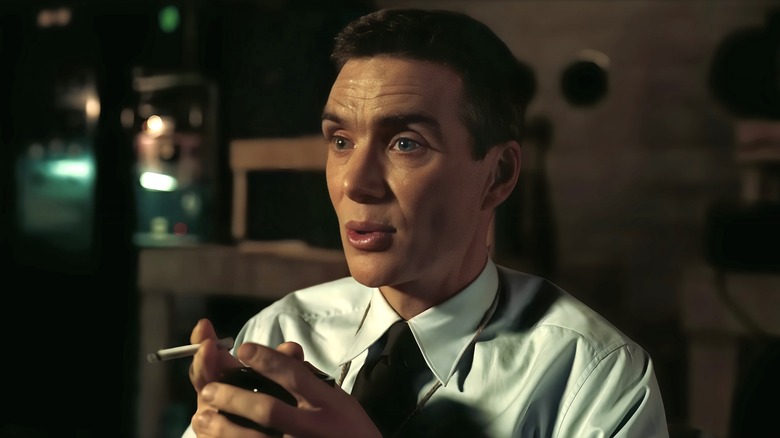 Cillian Murphy as J. Robert Oppenheimer holding cigarette