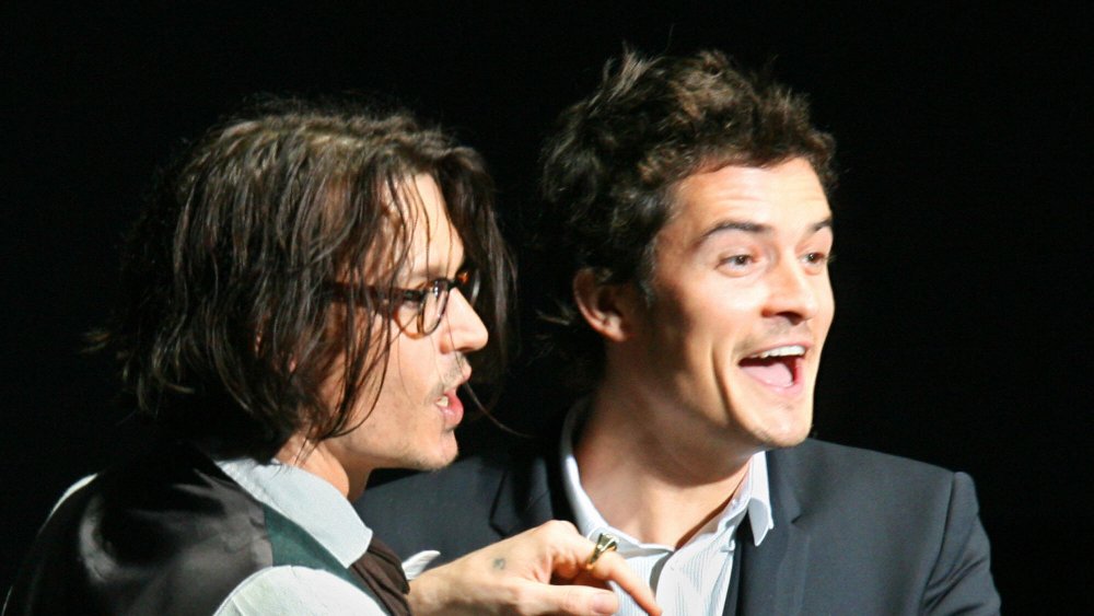 Johnny Depp and Orlando Bloom at the premiere of Pirates of the Caribbean: At World's End