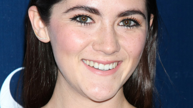 Isabelle Fuhrman smiling at event