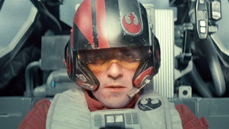 Poe Dameron wears helmet