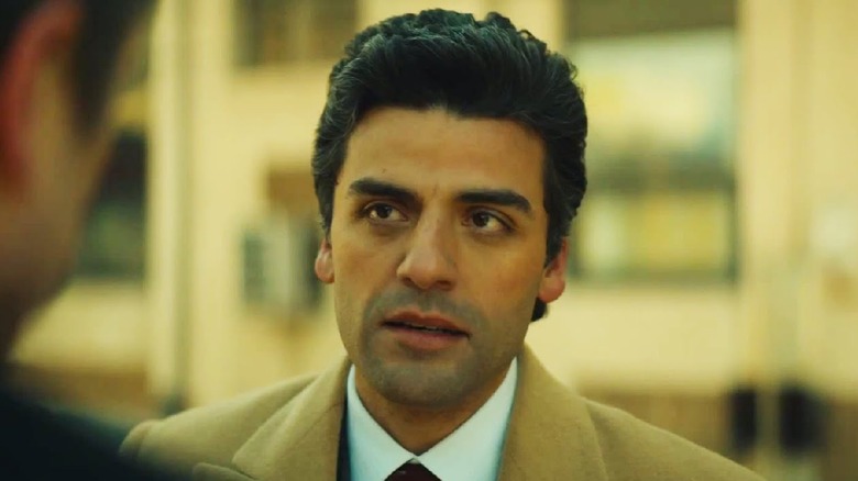 Oscar Isaac in a tan suit