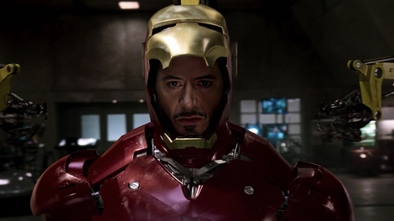 Tony Stark wearing Iron Man suit for first time