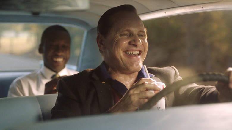 Tony Lip and Don Shirley laughing in car