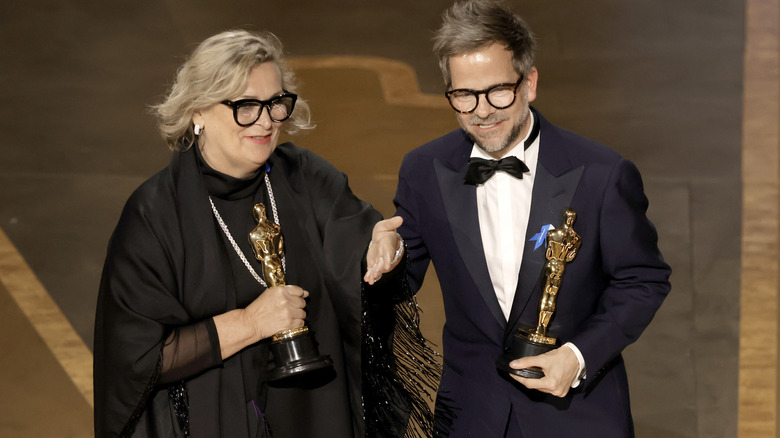 Christian M. Goldbeck and Ernestine Hipper collecting their Oscars