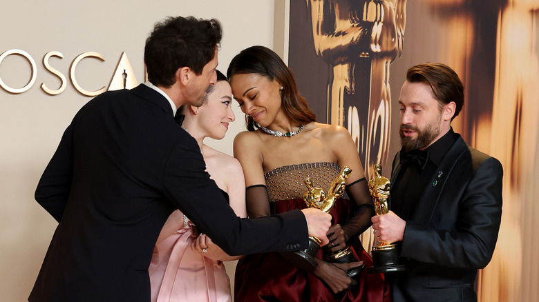 Adrien Brody Mikey Madison Zoe Saldana and Kieran Culkin with their Oscars