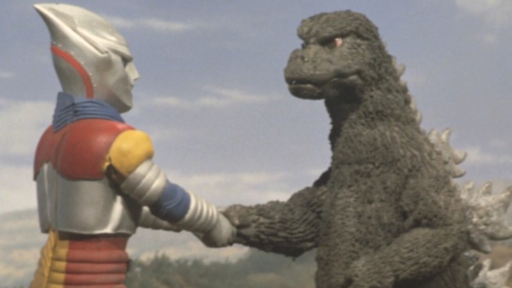 Godzilla shaking Jet Jaguar's hand