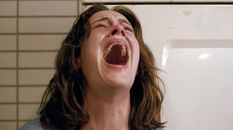 ECU of Sarah Paulson screaming as Lana Winters