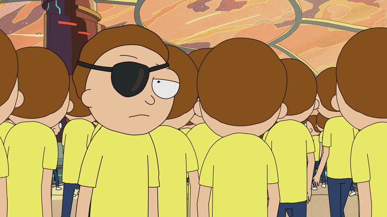 Eyepatch morty stares into camera in front of multiple Morty clones