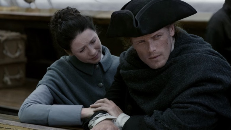 Outlander Claire comforts Jamie