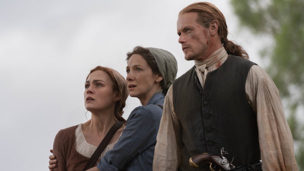 Sophie Skelton, Caitriona Balfe, and Sam Heughan on Outlander season 5