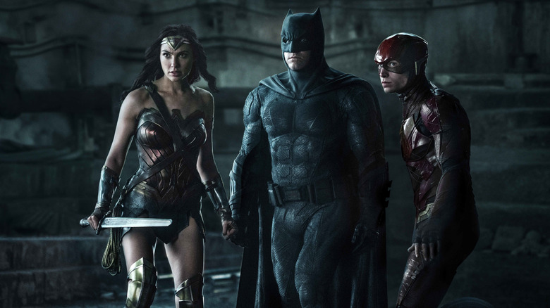 Wonder Woman, Batman, and the Flash preparing for battle