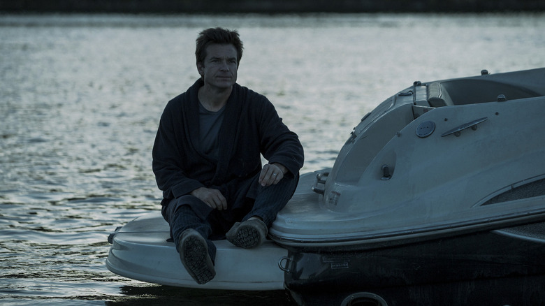 Marty sitting on a boat