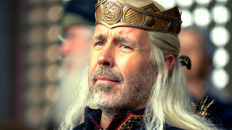 King Viserys watching jousting tournament